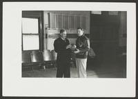 Dr. James Naismith (left) and Dr. Forrest "Phog" Allen (right)