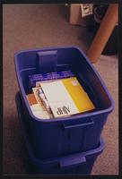 Care and handling training materials in library storage bin